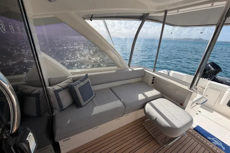  Yacht Photos Pics Luxurious interior of 2021 Riviera 50 Sports Motor Yacht with ocean view.