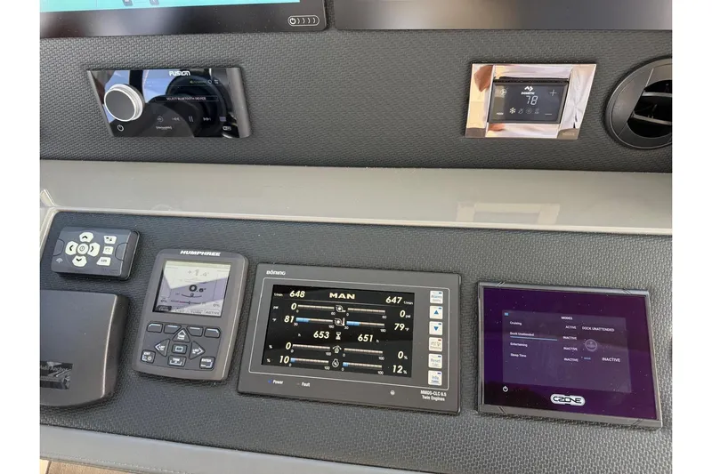  Yacht Photos Pics Control panel of 2021 Riviera 50 Sports Motor Yacht with advanced navigation systems.