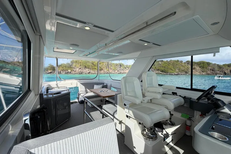 Yacht Photos Pics Interior of 2021 Riviera 50 Sports Motor Yacht with scenic ocean view.