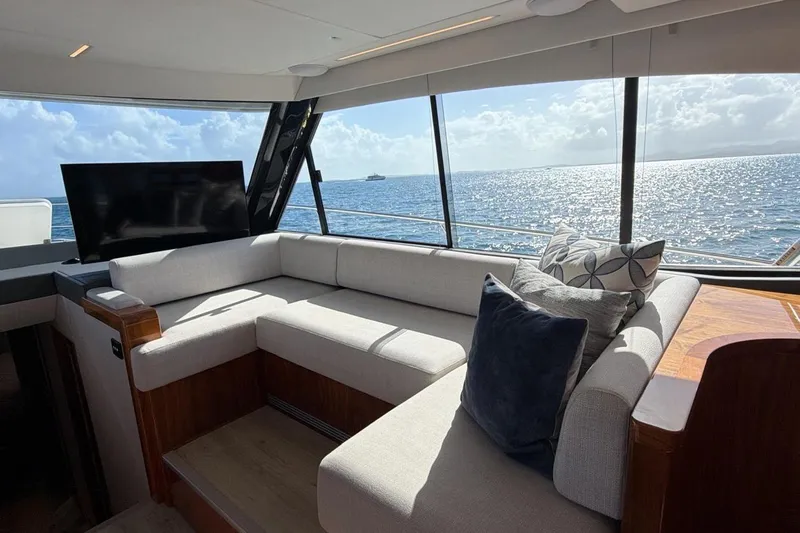  Yacht Photos Pics Luxurious interior of 2021 Riviera 50 Sports Motor Yacht with ocean view.