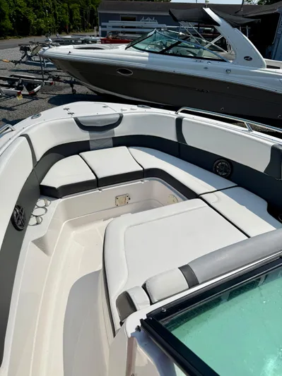  Yacht Photos Pics 2023 Chaparral 280 OSX boat with spacious seating and sleek design.