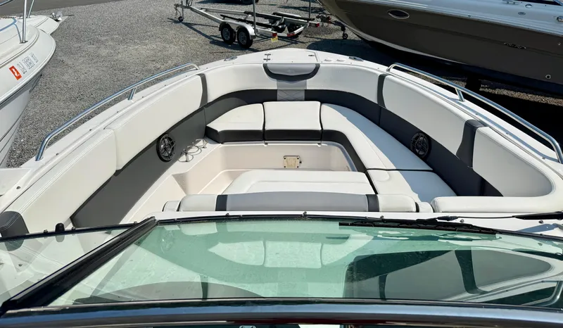  Yacht Photos Pics 2023 Chaparral 280 OSX boat interior with spacious seating and modern design.