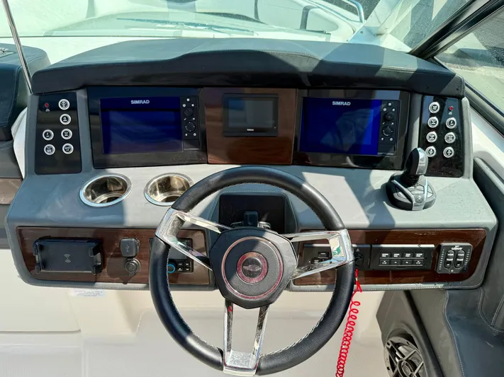  Yacht Photos Pics 2023 Chaparral 280 OSX dashboard with dual Simrad displays and modern controls.