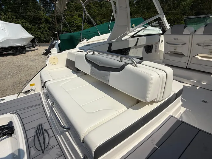  Yacht Photos Pics 2023 Chaparral 280 OSX boat with white leather seating and modern design.