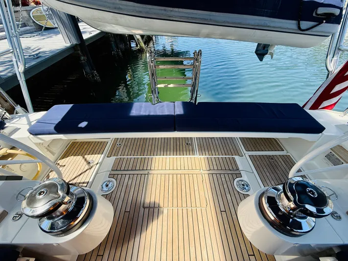 Freedom Yacht Photos Pics Beneteau Oceanis 55 (2015) yacht deck with winches and swim platform.