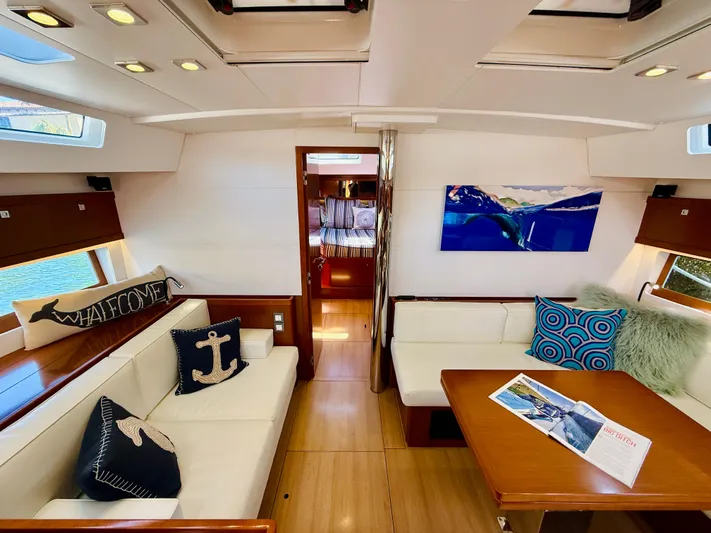 Freedom Yacht Photos Pics Luxurious interior of 2015 Beneteau Oceanis 55 yacht with elegant seating and decor.