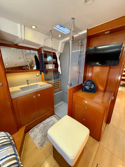 Freedom Yacht Photos Pics Interior of 2015 Beneteau Oceanis 55 yacht with modern amenities and wooden finishes.