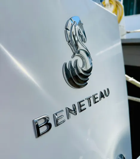 Freedom Yacht Photos Pics Beneteau Oceanis 55 yacht emblem, 2015 model, featuring sleek design and logo.