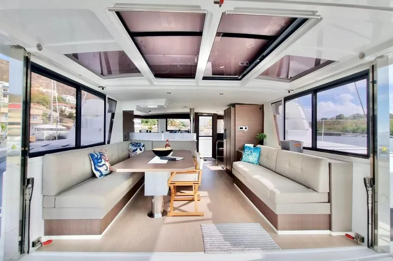 Breezin Yacht Photos Pics Luxurious interior of 2022 Bali 4.6 catamaran with spacious seating and modern design.