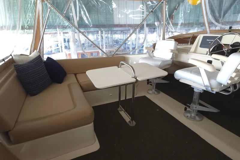 Nite Owl Yacht Photos Pics seating with a table
