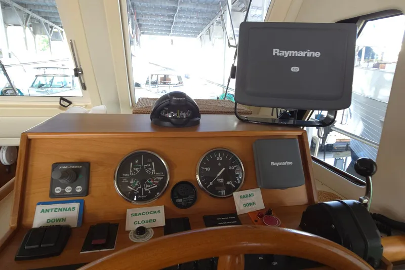 Nite Owl Yacht Photos Pics helm with Raymarine E80 display and navigation controls