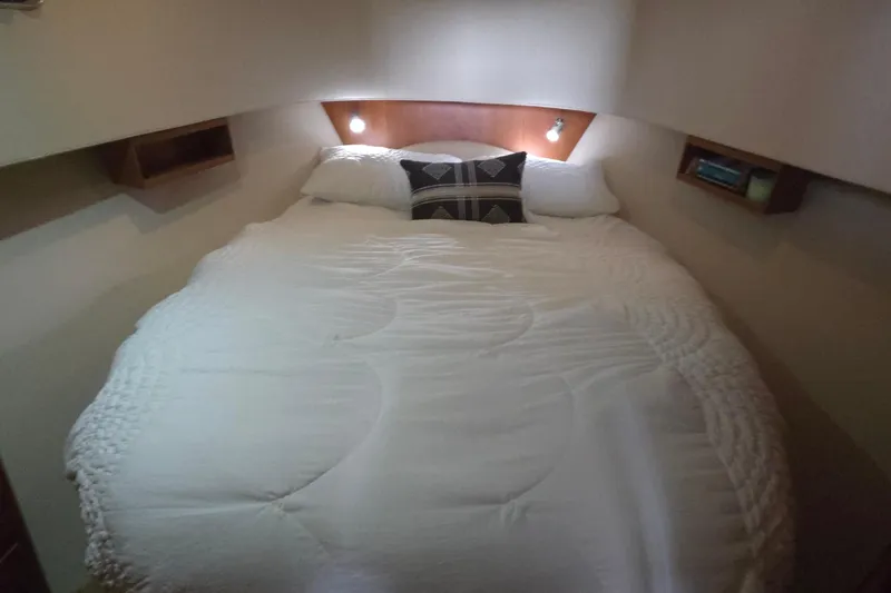 Nite Owl Yacht Photos Pics Cozy private cabin with a queen bed and ambient lighting