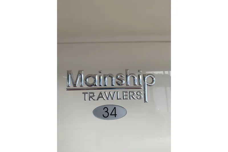 Nite Owl Yacht Photos Pics exterior logo, featuring chrome lettering