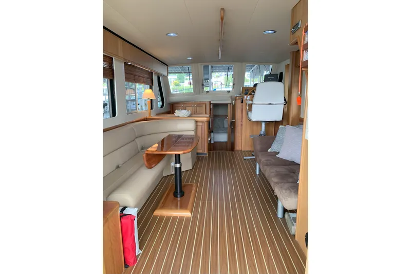 Nite Owl Yacht Photos Pics wood flooring and comfortable seating