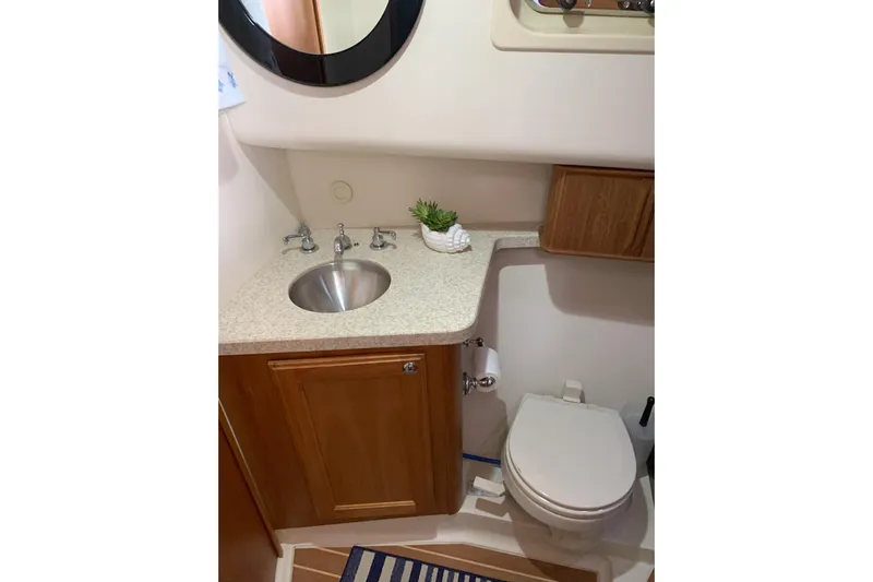 Nite Owl Yacht Photos Pics head with sink, toilet, and private access to the head