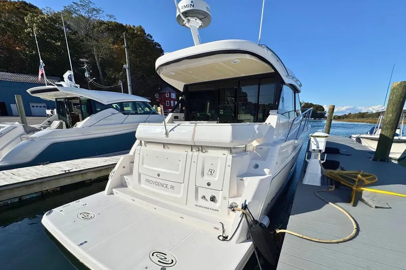  Yacht Photos Pics 2021 Regal 38 Grande Coupe yacht docked in Providence, RI marina.