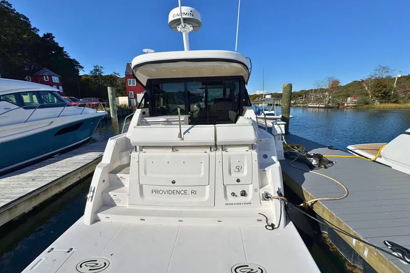 Yacht Photos Pics 2021 Regal 38 Grande Coupe docked in a marina, Providence, RI.