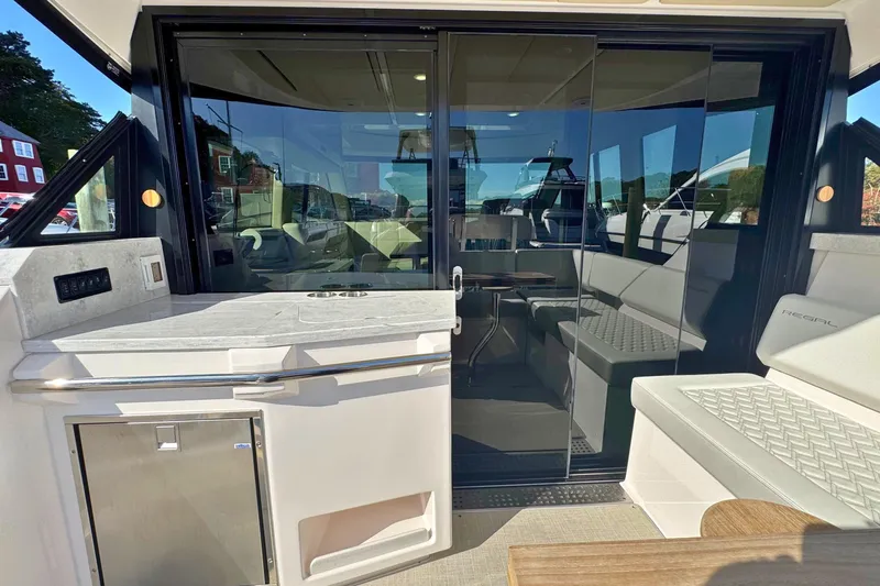  Yacht Photos Pics 2021 Regal 38 Grande Coupe interior with sleek seating and modern design.
