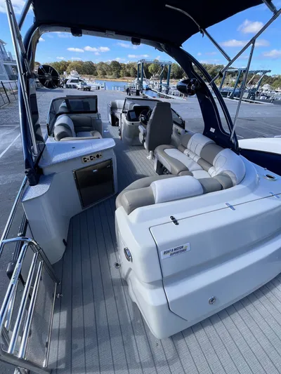  Yacht Photos Pics 2023 Avalon Excalibur Elite Windshield 27' boat interior with luxurious seating and modern amenities.