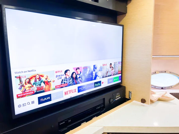  Yacht Photos Pics Entertainment system on 2005 Sunseeker Predator 68 yacht with streaming services displayed.