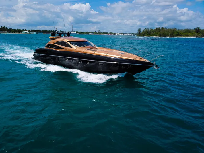 Yacht Photos Pics Luxury Sunseeker Predator 68 yacht cruising on blue waters, 2005 model.