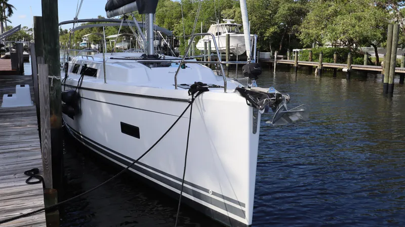 Wisp Yacht Photos Pics 2020 Hanse 388 yacht docked in a serene marina setting.