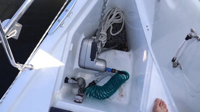 Wisp Yacht Photos Pics Anchor locker of a 2020 Hanse 388 sailboat with coiled rope and hose.