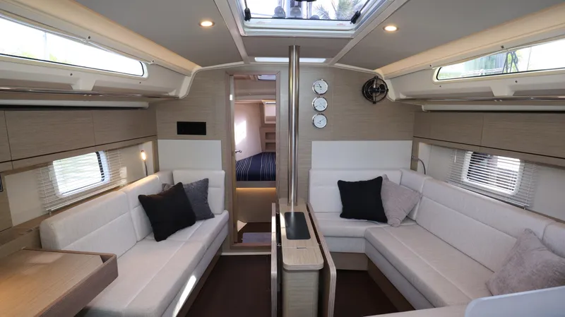 Wisp Yacht Photos Pics Interior of 2020 Hanse 388 yacht with modern seating and natural light.