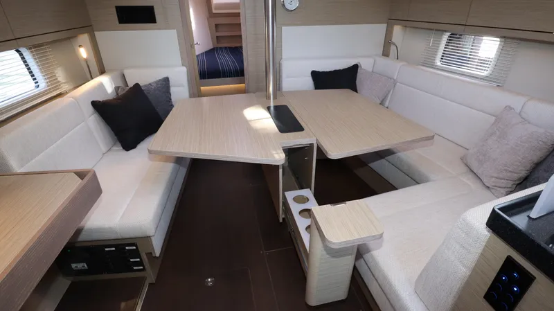Wisp Yacht Photos Pics Interior of 2020 Hanse 388 yacht with modern seating and dining area.