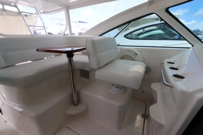 Lady K Yacht Photos Pics 2020 Tiara Yachts 43 Open interior with white seating and table.