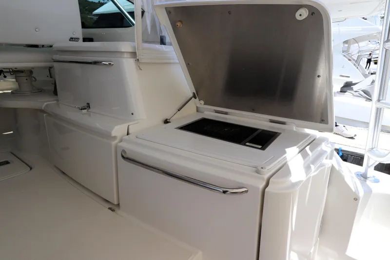 Lady K Yacht Photos Pics 2020 Tiara Yachts 43 Open yacht interior with open storage compartments.