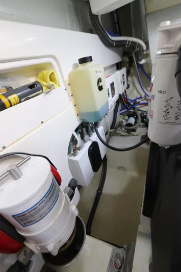 Lady K Yacht Photos Pics Engine room of 2020 Tiara Yachts 43 Open, showcasing mechanical components and wiring.