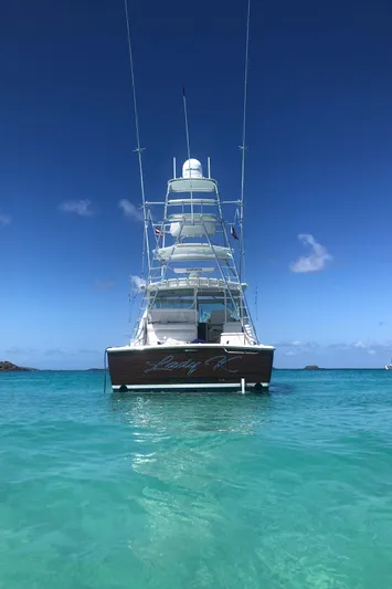 Lady K Yacht Photos Pics 2020 Tiara Yachts 43 Open in clear turquoise waters under a bright blue sky.