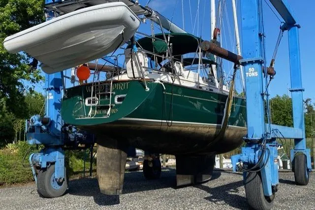 Wild Spirit Yacht Photos Pics Sailboat "Water Spirit" on a lift, Passport 456 model, 1999, in a boatyard.