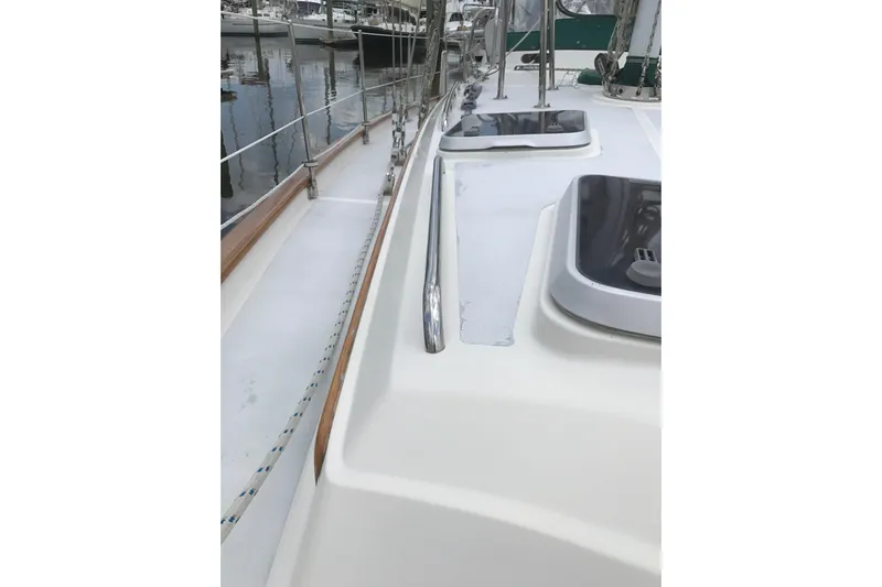 Wild Spirit Yacht Photos Pics Sailboat deck view, Passport 456 model, 1999, docked in marina.