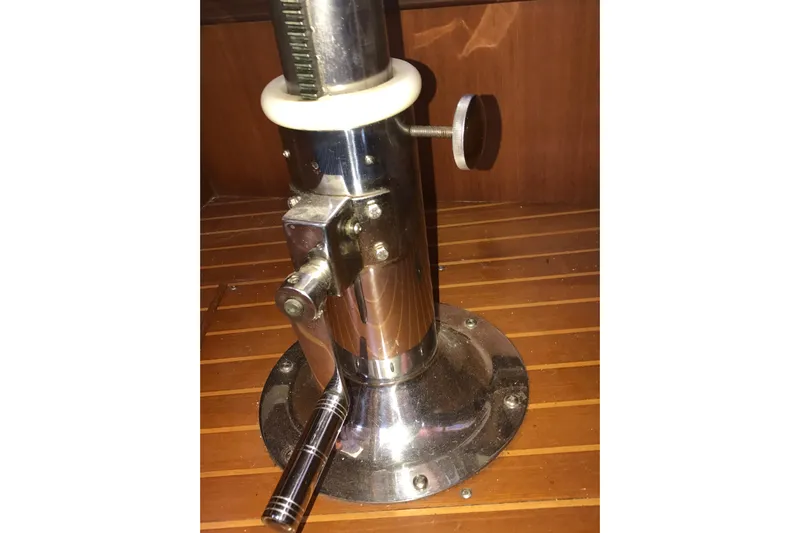 Wild Spirit Yacht Photos Pics Chrome mechanical device on wooden surface, Passport 456 model, 1999.