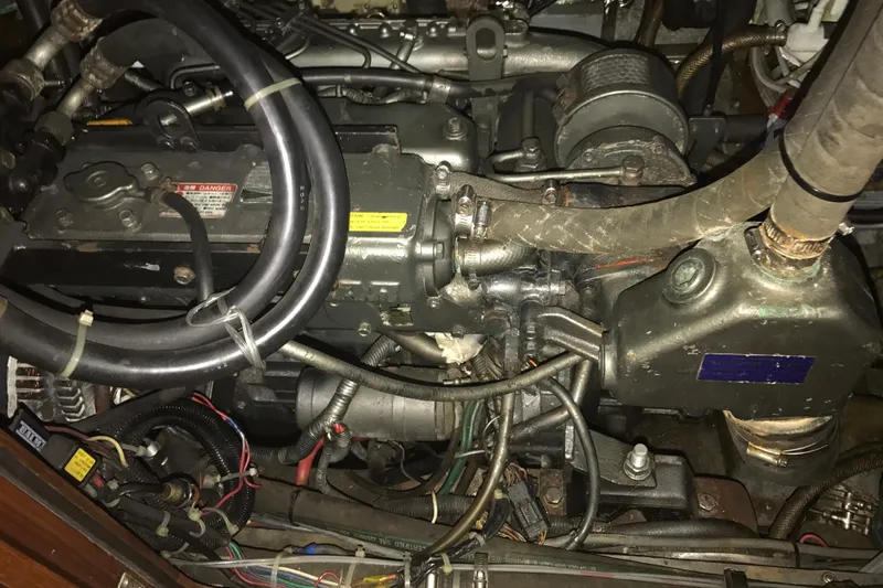 Wild Spirit Yacht Photos Pics Engine compartment of a 1999 Passport 456 with hoses and wires.