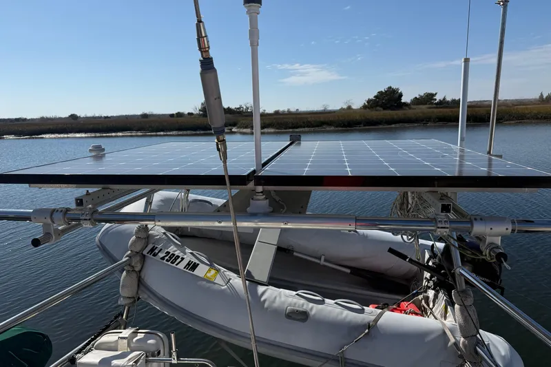 Wild Spirit Yacht Photos Pics Solar panels on a boat with inflatable dinghy, Passport 456, 1999 model.