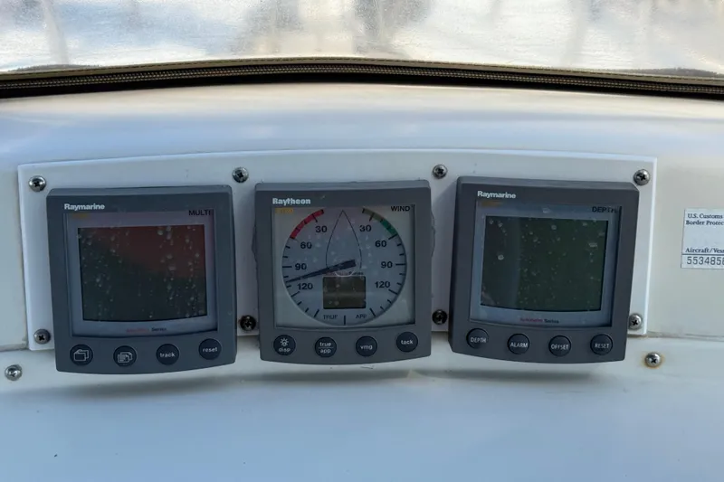 Wild Spirit Yacht Photos Pics Boat dashboard with Raymarine and Raytheon instruments, Passport 456, 1999 model.