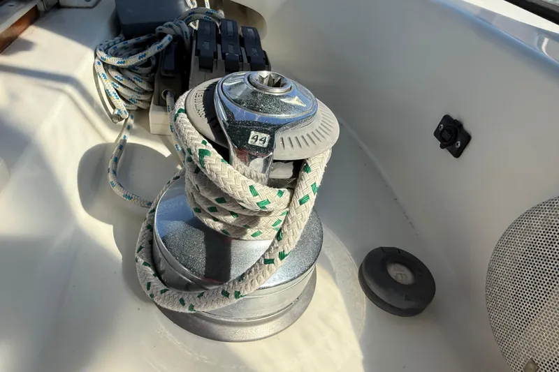 Wild Spirit Yacht Photos Pics Sailboat winch with rope on a 1999 Passport 456 yacht deck.