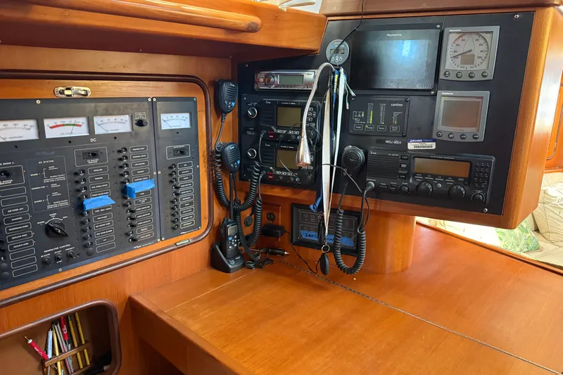 Wild Spirit Yacht Photos Pics Control panel with navigation and communication equipment on a 1999 Passport 456 yacht.