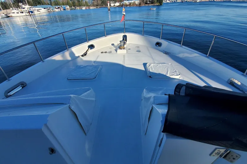 Katula Yacht Photos Pics 2003 Mikelson Long Range Cockpit MY yacht deck with scenic marina view.