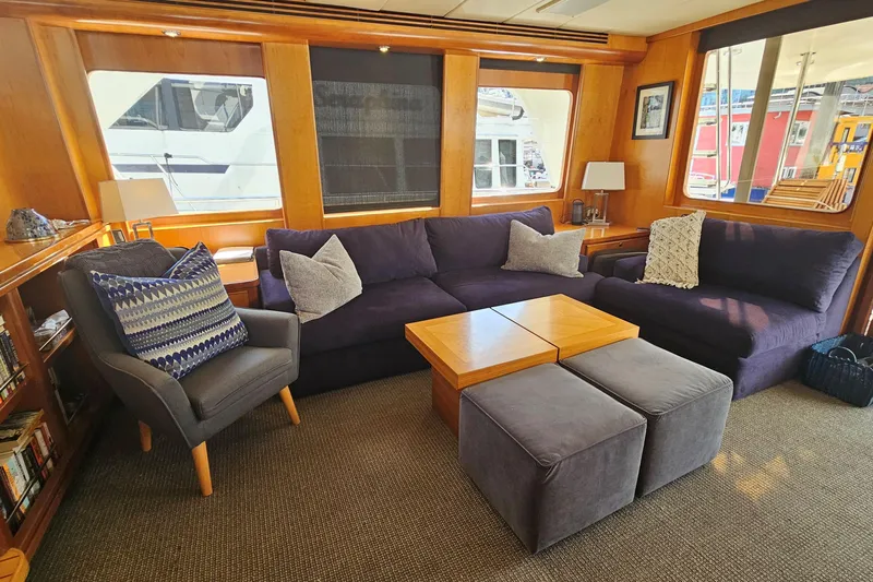 Katula Yacht Photos Pics Luxurious 2003 Mikelson yacht interior with cozy seating and elegant decor.