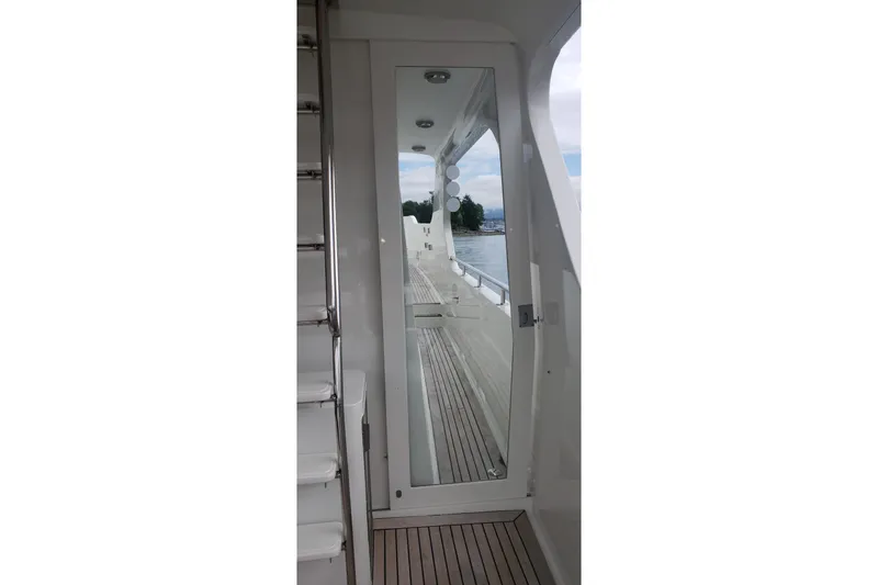 Katula Yacht Photos Pics 2003 Mikelson Long Range Cockpit MY yacht interior with sleek design and ocean view.