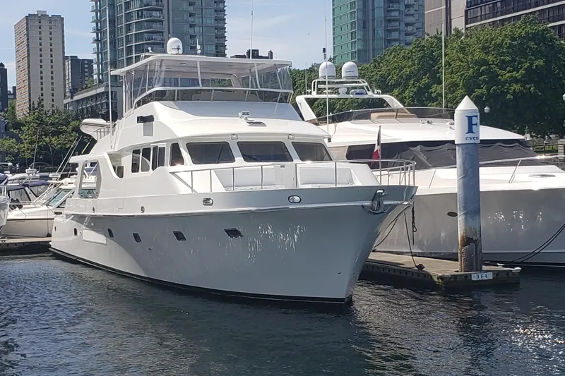 Katula Yacht Photos Pics 2003 Mikelson Long Range Cockpit MY yacht docked in urban marina setting.