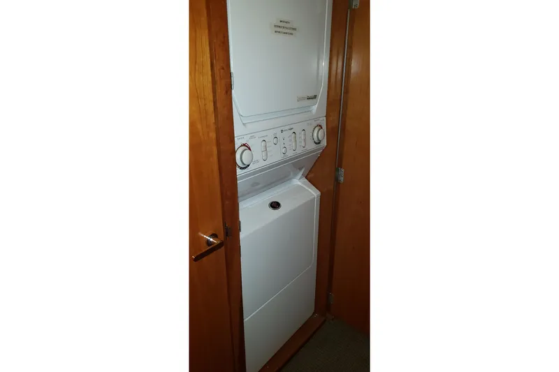 Katula Yacht Photos Pics Stacked washer and dryer in 2003 Mikelson Long Range Cockpit MY yacht.