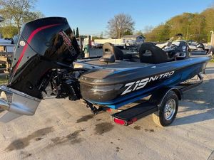 2024 Nitro Z19 boat with powerful outboard motor, sleek design, and trailer.