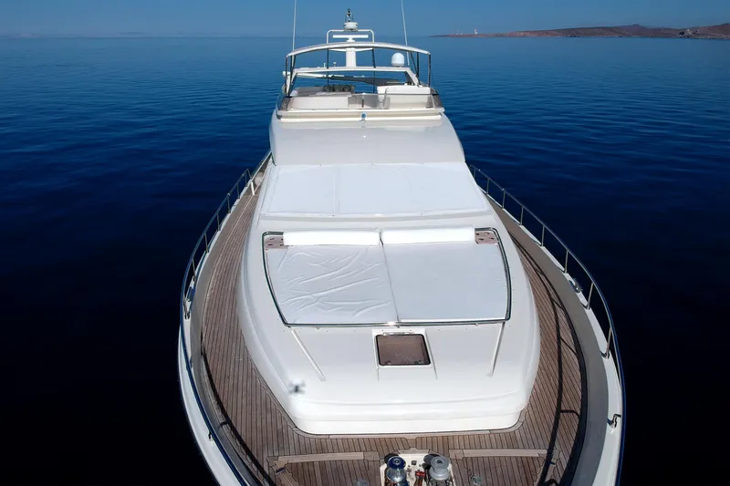 Santa Maria II Yacht Photos Pics 1997 Ferretti Yachts 80 model cruising on calm blue waters.