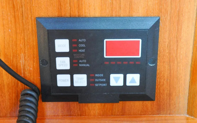 Coralee Yacht Photos Pics Hunter 45CC - Coralee - Navigation Station - AC Controls