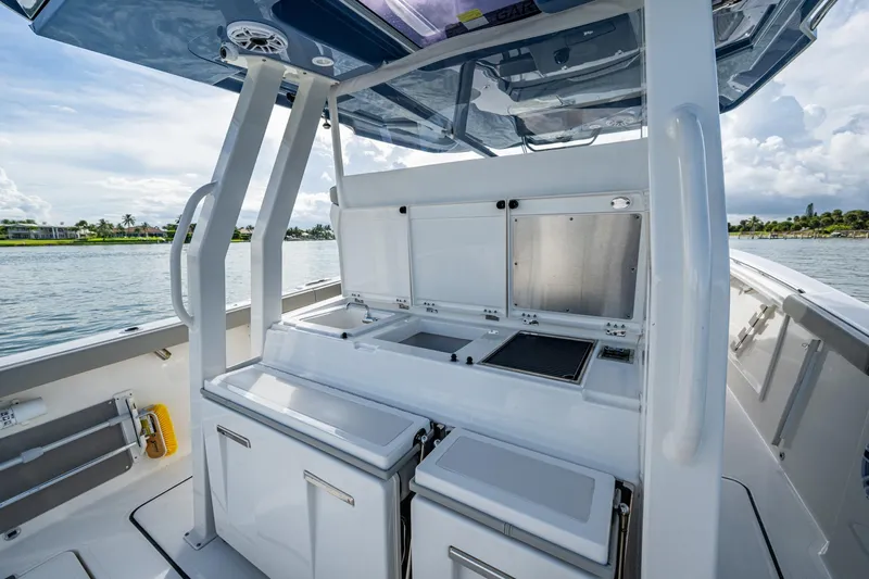 Island Girl II Yacht Photos Pics 2023 Pursuit S 358 Sport boat interior with sleek design and modern amenities.